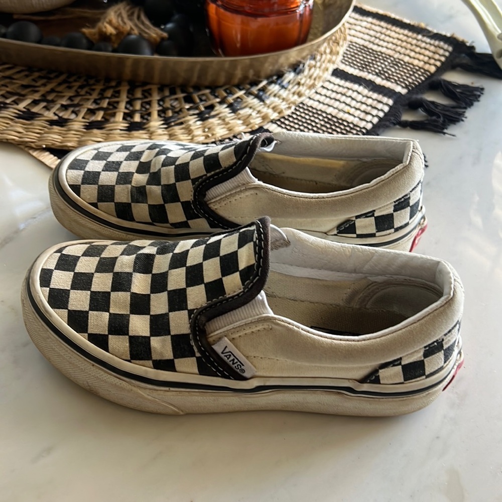 Checkered vans.